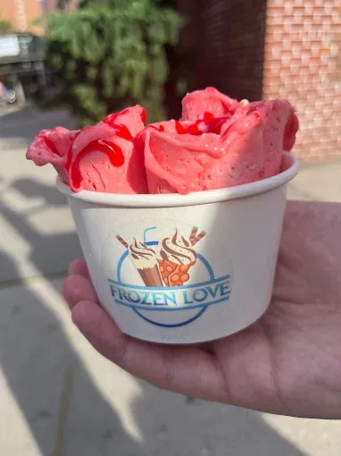 Pink strawberry ice cream rolls in a Frozen Love cup